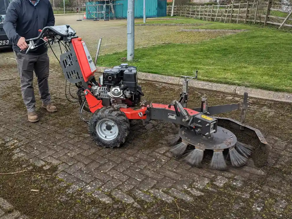 Weed Brushing: The Key to Long-Term Hard Surface Maintenance - Cover Image